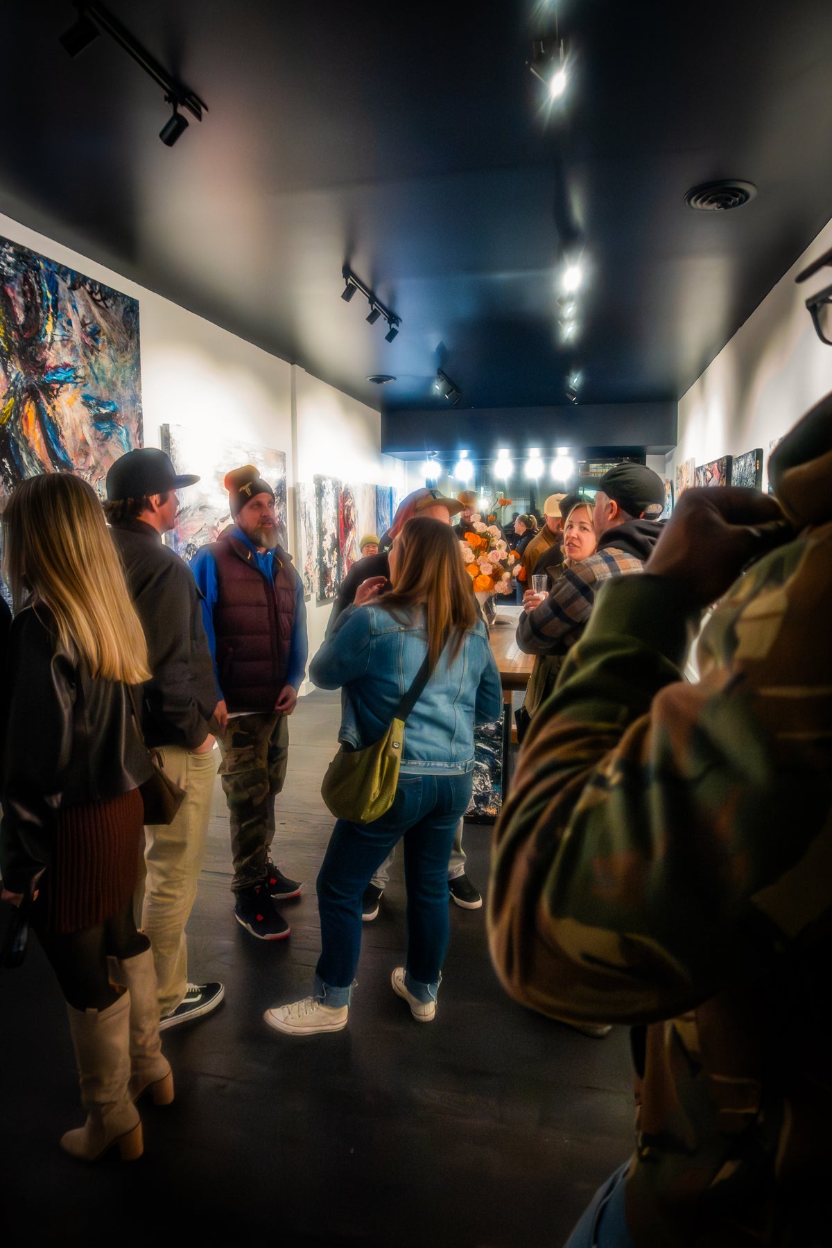 People enjoying First Friday at artHouse LTA